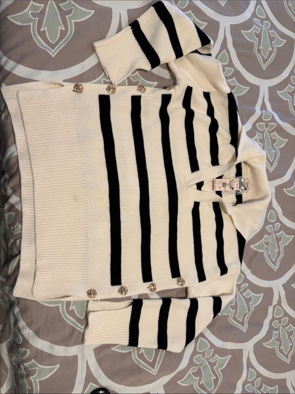Classic Black and Cream Striped V-Neck Sweater with Button Accents